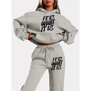 Women’s hoodie tracksuit set with geometric letter patterns, casual style, made from 100% polyester knit fabric; autumn–winter long-sleeve top and pants with pockets