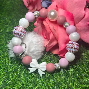 Mauve enchanted Wristlet Keychain color scheme white, lavender, dusky pink and bling beads made with wire