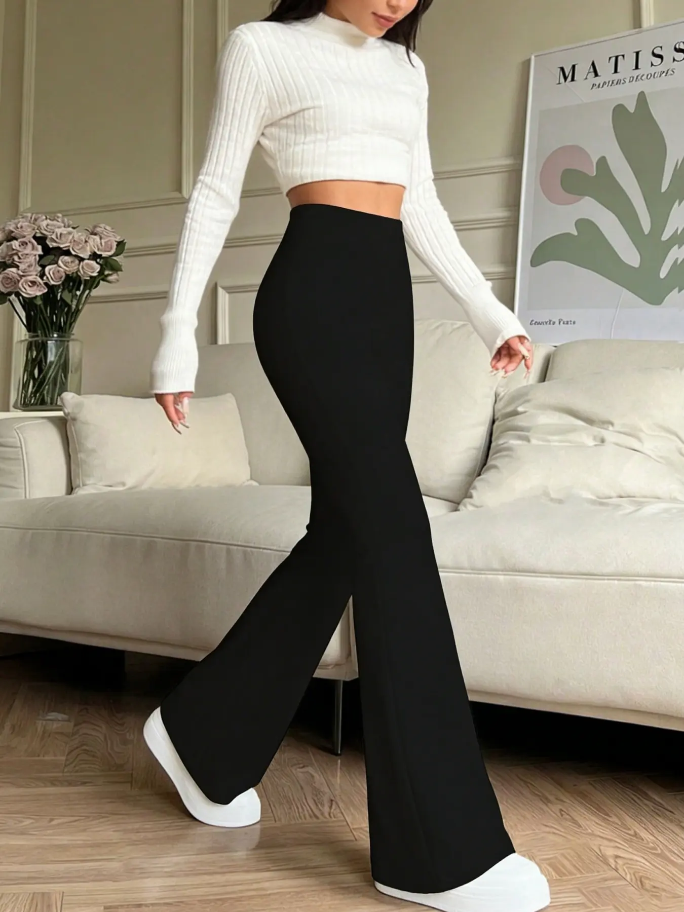 A women's casual and fashionable high waisted slightly flared pants that look slim and high hanging, versatile casual pants suitable for all seasons, suitable for home, indoor, and outdoor wear