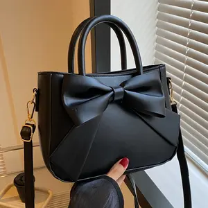 Elegant black bow-adorned handbag - a women's double-handle leather tote with gold-tone hardware and a detachable crossbody strap, a fashionable small shoulder bag suitable for daily use, a versatile shoulder bag|Fashion handbag|