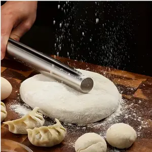 1 PC simple stainless steel rolling pin, along with a thick silicone dough handling pad. Suitable for making pizza, cookies, dumpling wrappers, wonton wrappers, etc.