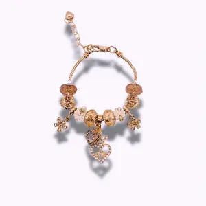 “Golden hearts” charm bracelet