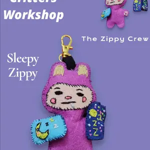The Zippy Crew Sleepy Zippy Felt Keychain with Blue Accessories and Gold Clip