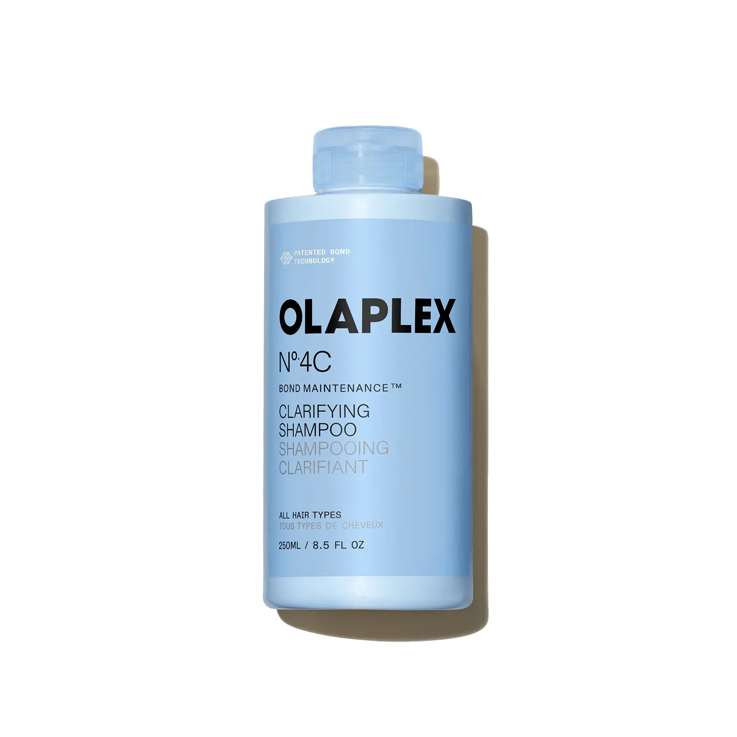 OLAPLEX Nº.4C Bond Maintenance Clarifying Shampoo - A weekly clarifying shampoo that removes damaging buildup from the scalp and all hair types and textures to restore color vibrancy, shine, and softness.