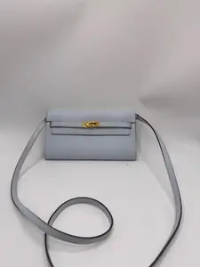 Pre-owned HERMÈS Kelly To Go, Misty Blue with Gold Hardware, Z Stamp, 99% New Condition. Can be worn as a shoulder or crossbody bag. Some hardware still has protective film intact.