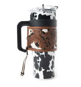 Black & White Cow Print 40oz Western Tumbler – With Removable Tooled Leather Sleeve