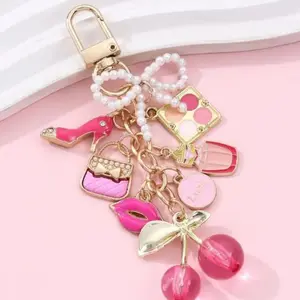 Elegant Lipstick Keychain, Pearl Bow Cherry Perfume Oil Alloy Pendant, Fashionable Keychain, High-End Style Accessory, Stylish Keychain
