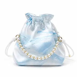 MIRANIQUE Handmade Marbled Pearl Drawstring Bag | One-of-a-Kind Satin Handbag