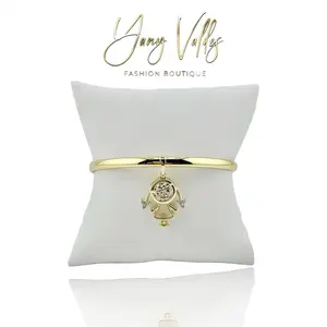 Bangle bracelet with charm design and gold plated finish