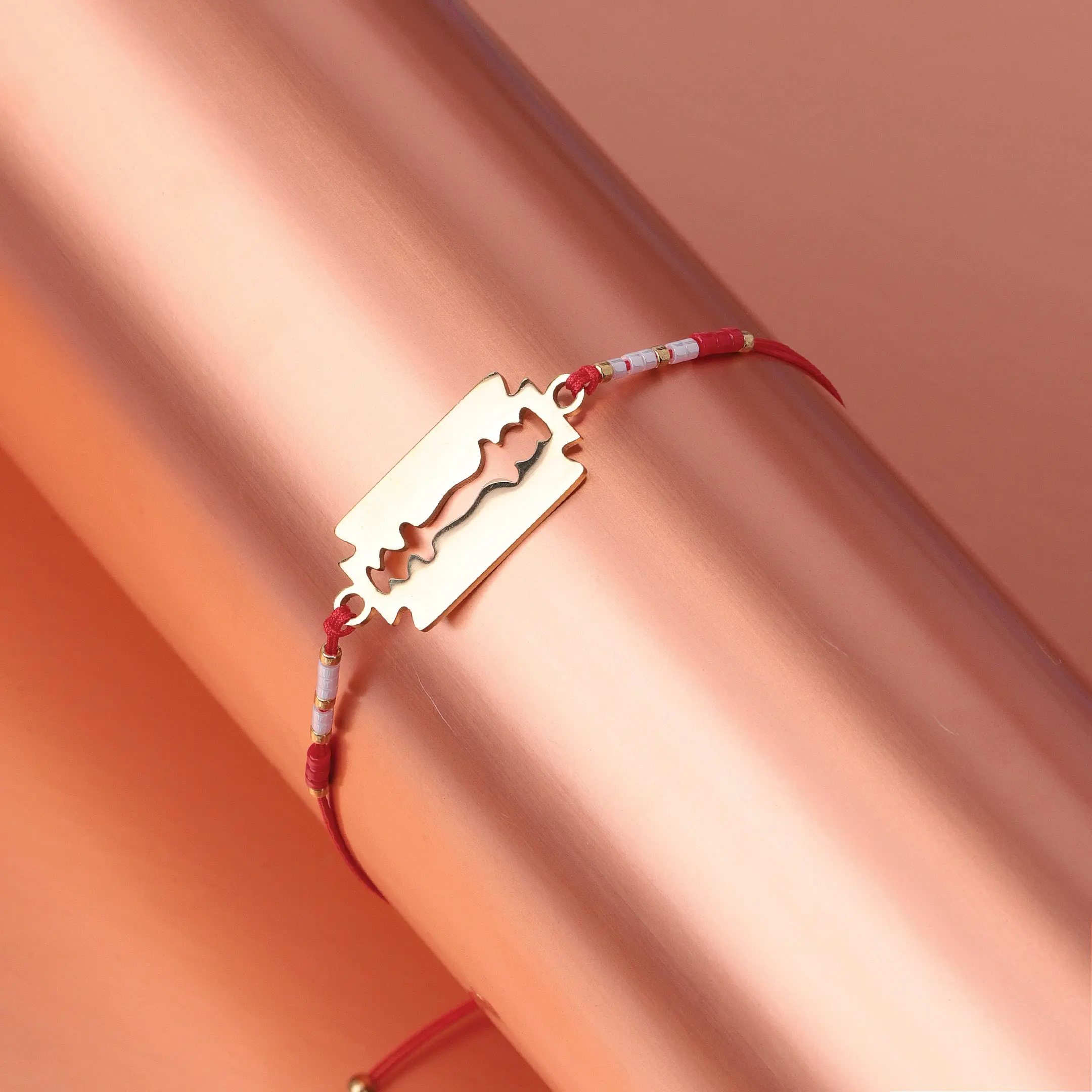 Razor Charm Red Braided Bracelet