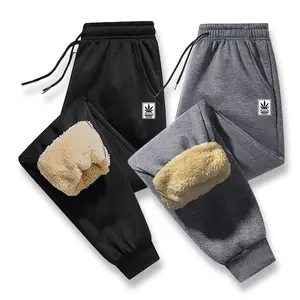 Men's winter fleece-lined warm sports pants. Fleece lining for comfort, pants with drawstring waistband, featuring printed designs. Suitable for everyday casual wear in winter, a must-have item for the winter wardrobe.