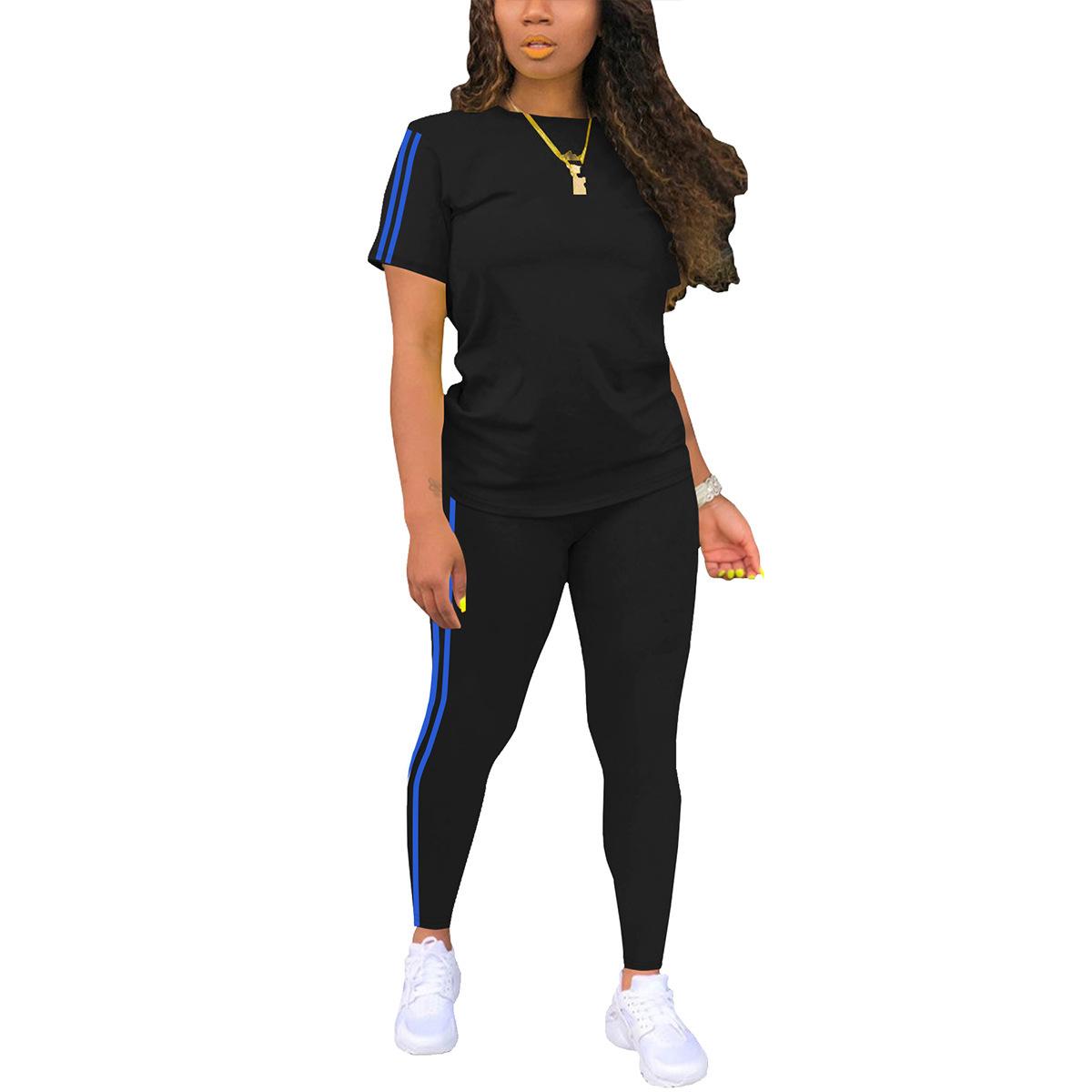 Women’s athletic fitness striped set: short-sleeve top with white side stripes + high-waisted leggings, slim fit that flatters the figure, two-piece set