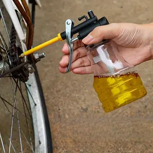 High Pressure Transparent Oil Bottle with Copper Tip Nozzle - Durable Plastic Hose, Drop-Resistant Design for Secure Fuel Injection, Fit for All Vehicles, Automotive Lubrication, Sleek Cylindrical Design, Transparent Construction