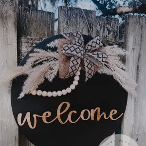 Black and wood stained boho western welcome door hanger signs