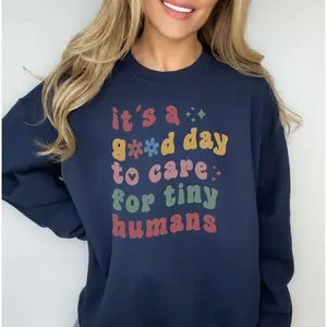 It's A Good Day to Care For Tiny Humans Sweatshirt - Daycare Teacher Sweatshirt, Gift for Babysitters & Preschool Teachers, Cotton Crewneck, Unisex