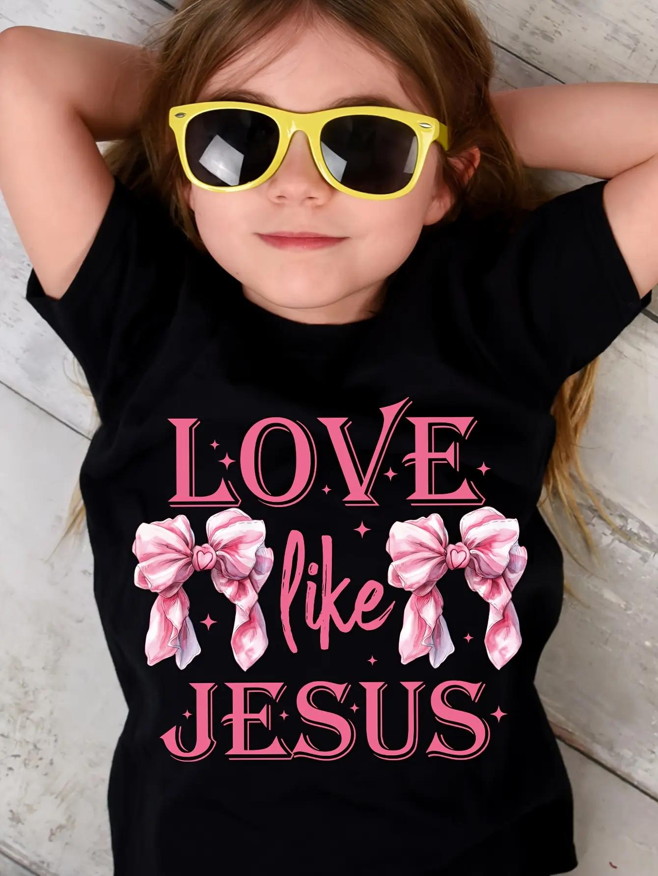 Love Like Jesus Kids T-Shirt Watercolor Pink Coquette Bow Sparkle Star Serif Script Graphic Short Sleeve Cotton Black Toddler Girls Christian Faith Casual Tee