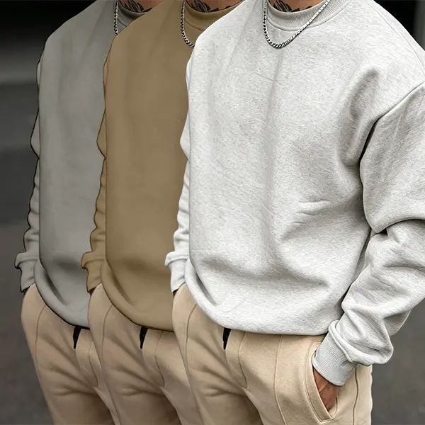 Premium cotton crewneck sweatshirt for modern mensfashion, relaxed casual silhouette paired with jogger trousers, street daily wear with laid-back comfy styling for gentlemen.