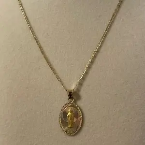 14k gold three tone chain with San Judas pendant