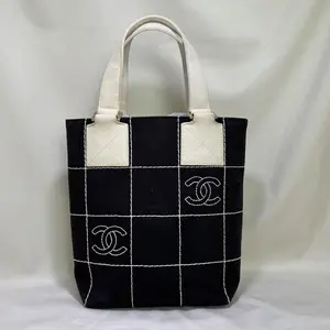 Pre-owned CHANEL Black and White Grid Canvas Tote Bag, Designer Luggage Accessory Monica
