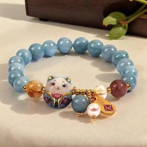 Lucky cat bracelet with blue crystal, ceramic cat pendant, Feng Shui good luck jewelry, wealth and protection bracelet