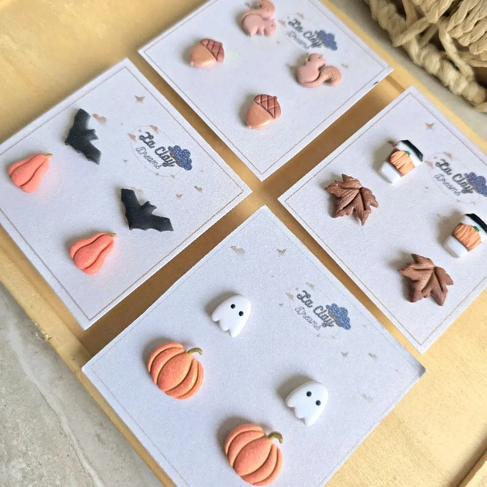 Cute Fall studs polymerclay earrings - pack of two different variations; squirrel with acorns, bats with squash, coffee cups with maple leafs, and ghosts with pumpkins.