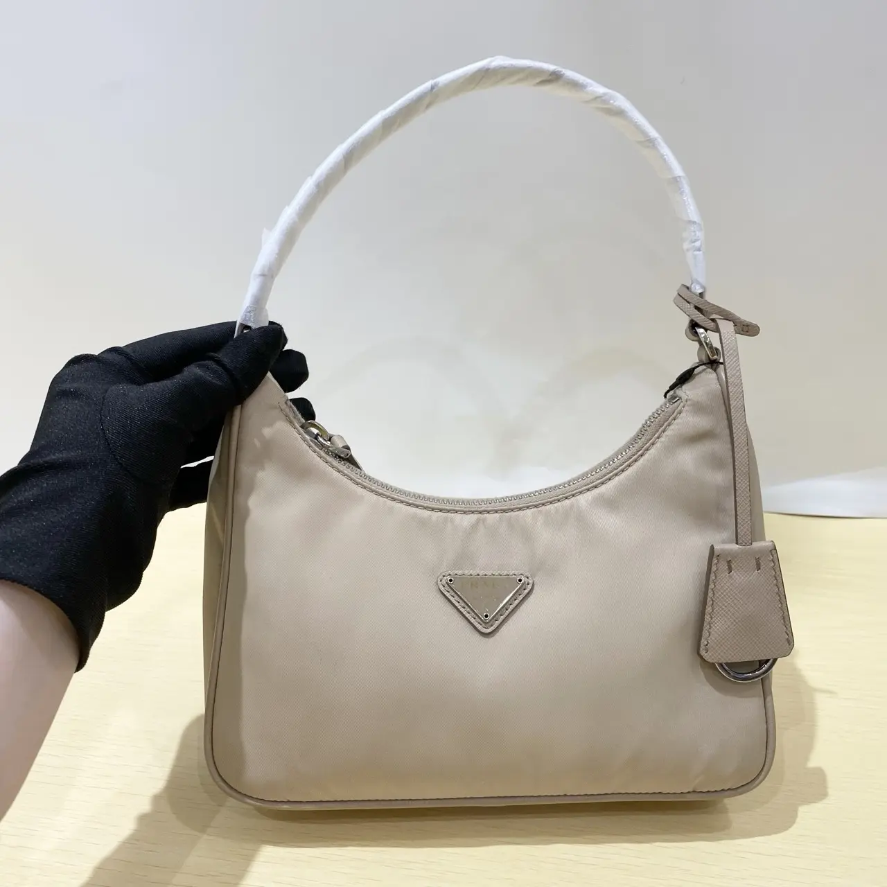 Pre-owned PRADA Re Nylon 2005 Hobo Shoulder Bag Milk Tea Color, Crossbody Bag with Zip (2417955), Shoulder Bags