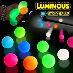 Luminous Sticky Balls Set Glow in the Dark Stress Relief Toys for Kids & Adults Perfect for Party or Family Entertainment Birthday or Holiday Gifts Includes 4 Balls   &  Energy Lamp   &     Static Cling Film & Tape   &  Storage Box