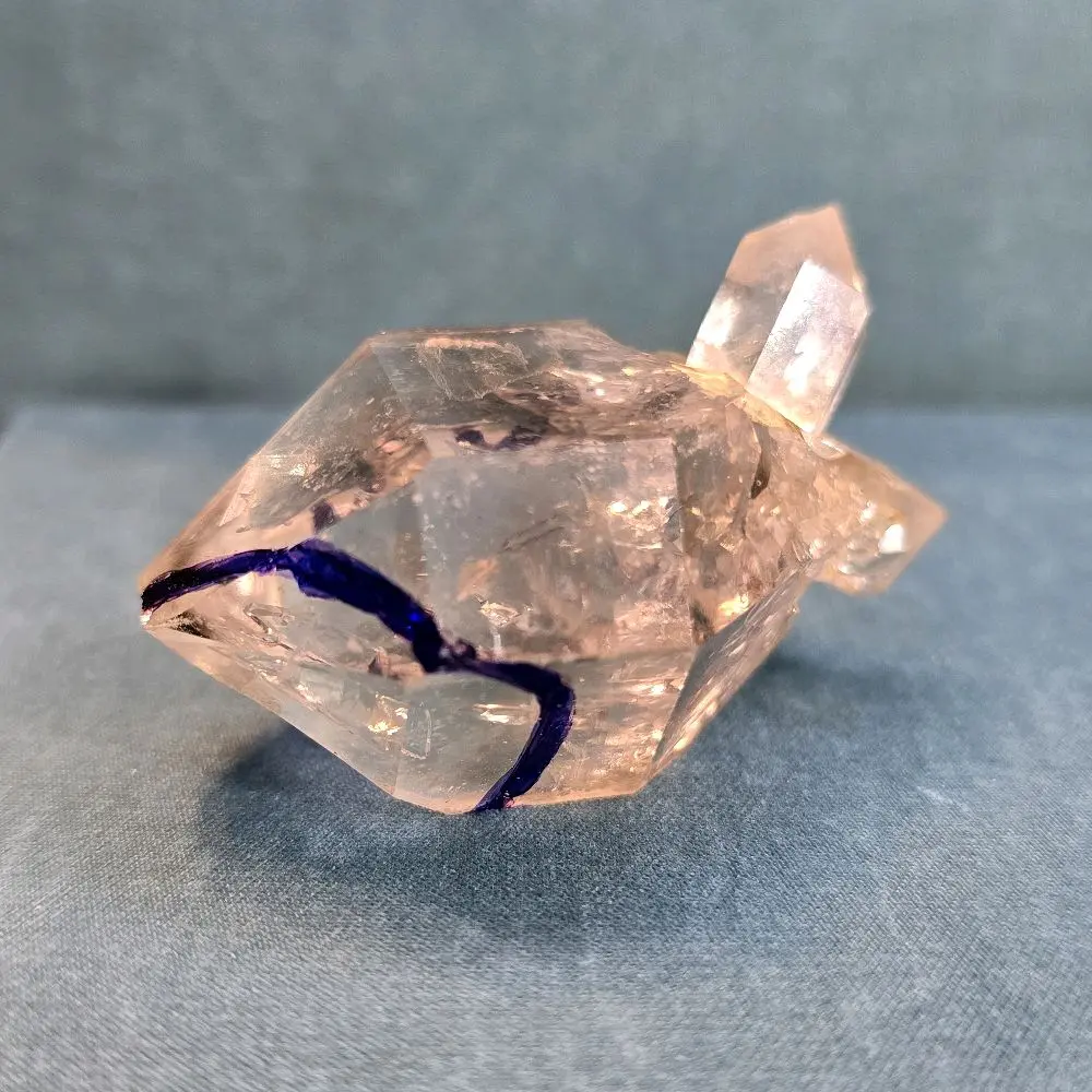 Enhydro Crystal with Varying Colors and Crucial Features