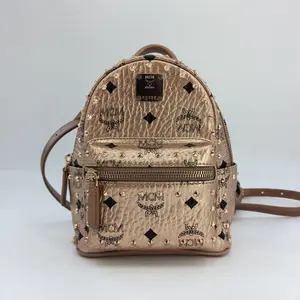 Pre-owned MCM Canvas Backpacks Metallic Visetos Mini Side Stud Stark Backpack Champagne Gold JX0025