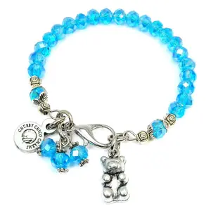 Adorable Gummy Candy Teddy Bear Splash Of Color Crystal Bracelet. Gorgeous Deep Sapphire Blue Crystals with Iridescent Colors.