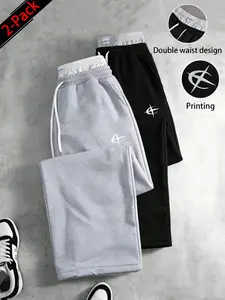 Two-pack unisex Y2K street style joggers, double-waist workout joggers featuring a star print faux two-piece design with contrasting double waistband detailing; loose, casual jogging pants for both men and women, perfect for creating fashionable looks, ve