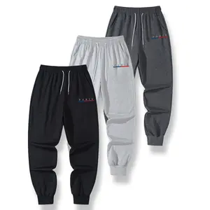 Men's drawstring waist casual pants for spring and autumn, with pockets, printed design, regular fit suitable for everyday casual wear in spring and autumn