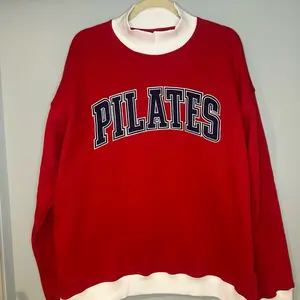 Pilates Dual Toned Embroidered Mockneck