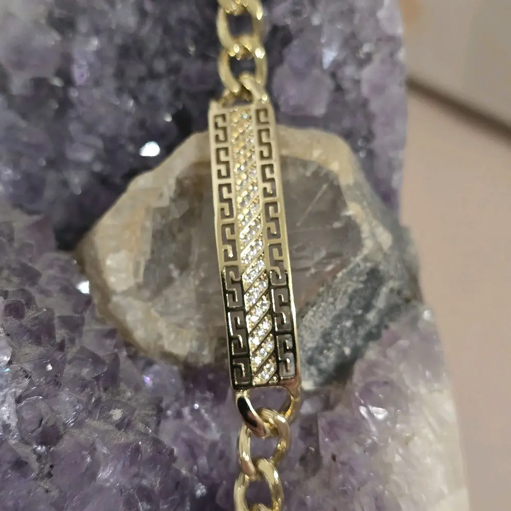 Elegant Gold-Toned Bracelet with Intricate Greek Key Design and Durable Chain for Everyday Wear