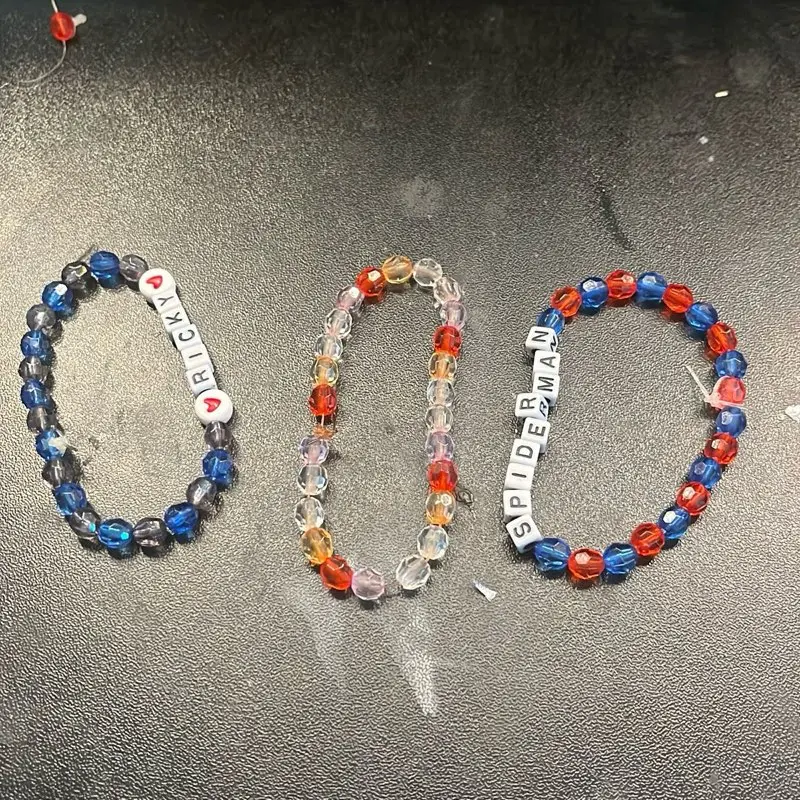 Beaded Bracelets - Black & Red Beaded Designs, Featuring "CHARLETTES" & "SPIDERMAN" Text, Simple and Elegant Style