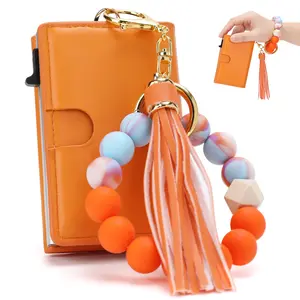 PU Leather Wallet with Bracelet for Women, Slim Boho Beaded & Tassel Card Holder Purse, RFID Blocking, 7-11 Card Capacity & ID Window Keychain Wallet