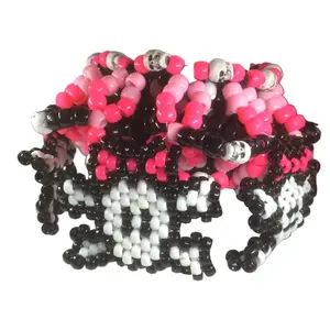 Epic Kandi UFO Cuff Kandi Bracelet with 5 Skulls and Bones Neon Pink Bow  EDC  EDM