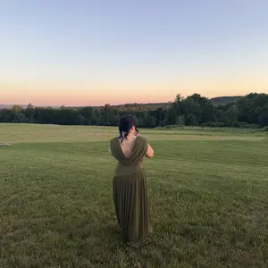 Customer wearing the Athena Gown