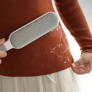 1 piece two-in-one double-sided electrostatic hair and dust remover. Powerful manual electrostatic technology. Suitable for pet hair and fluff on carpets, furniture, clothes, bedding. Ergonomic handle for handheld fabric brush.