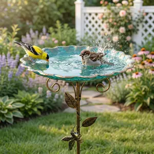 A new, elegant turquoise birdbath/feeder featuring a gold-tone hummingbird and vine leaves/stone-textured accents, with a five-pronged base for secure placement. Perfect for the garden and an excellent gift choice for holidays or everyday use.