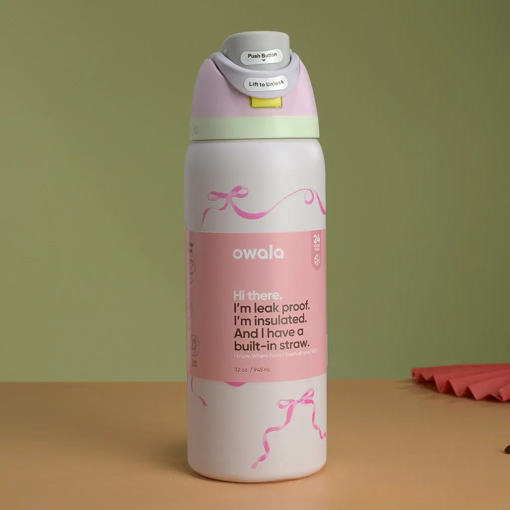 Owala FreeSip Insulated Stainless Steel Water Bottle with Built-in Straw, Leak-Proof, Cold for 24 Hours, Pink Ribbon / Coquette Bow Edition