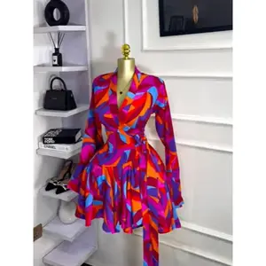 Women’s tie-dye print long-sleeve dress featuring a trumpet silhouette, V-neckline, and bow-adorned hem; suitable for autumn and winter; an elegant choice for holiday parties and birthdays. GARMENTARY