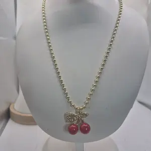 Cheery Pendant Necklace Laminated Gold with Red Cherry Charm and Green Leaf Accent