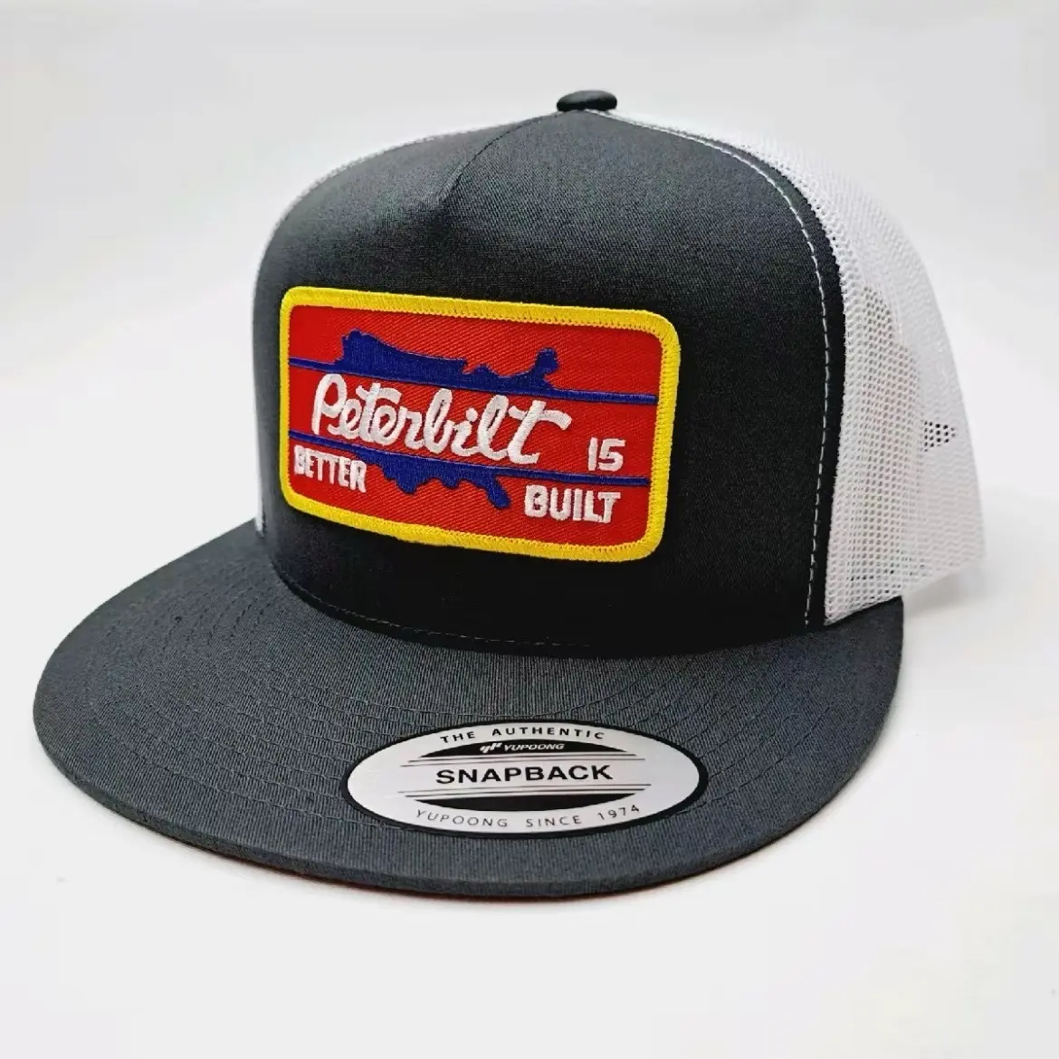 Peterbilt Embroidered Patch Edgy Flat Bill Statement Trucker Hat, Gray & White Mesh Snapback Cap for Sports & Outdoor Use