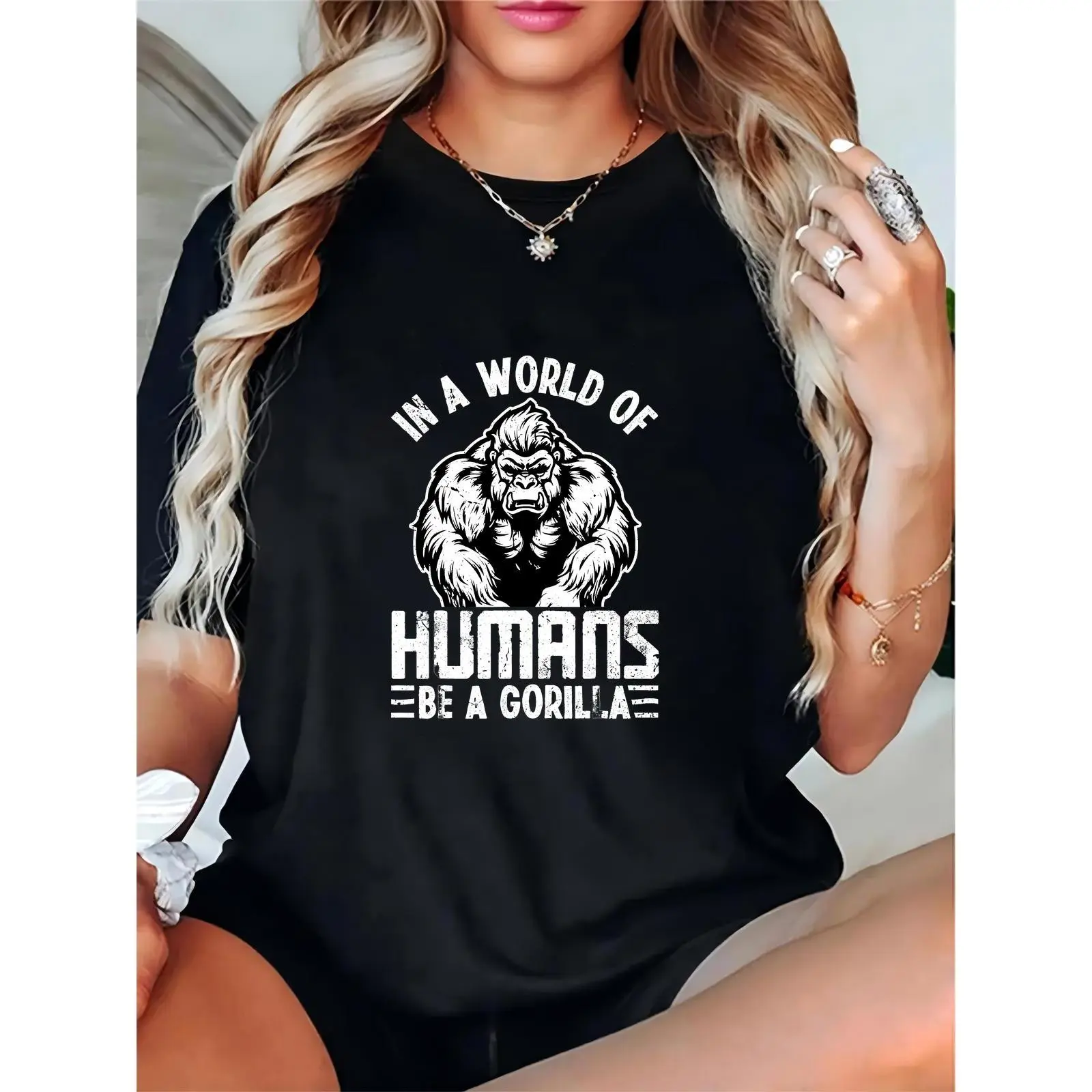 Women’s Black Gorilla Graphic T-Shirt, “In a World of Humans Be a Gorilla” Slogan, Casual Streetwear for Daily/Gym/Festivals, Trendy Animal Print Top