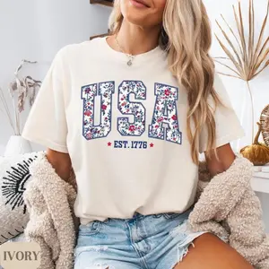 Women's Comfort Colors Short-Sleeve Round Neck Soft Casual T-Shirt - Floral USA Lettering, Patriotic 1776 Graphic, 4th of July Vintage America Top, Oversized Heavyweight Cotton Unisex Apparel