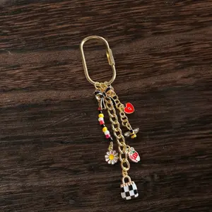 Strawberry Cutesy Bag Charm with bee, Daisy, and Checkered Design