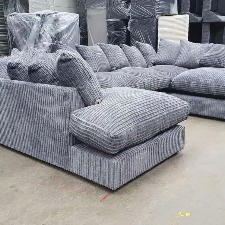 BRAND NEW GREY JUMBO SECTIONAL COUCH WITH PILLOWs