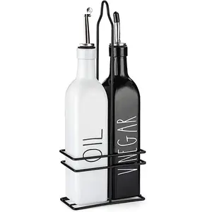 Oil and Vinegar Dispenser Set (2x500ml) Black & White Bottle stainless steel spouts & top. Our oil dispenser set is modern design fits every kitchen Container