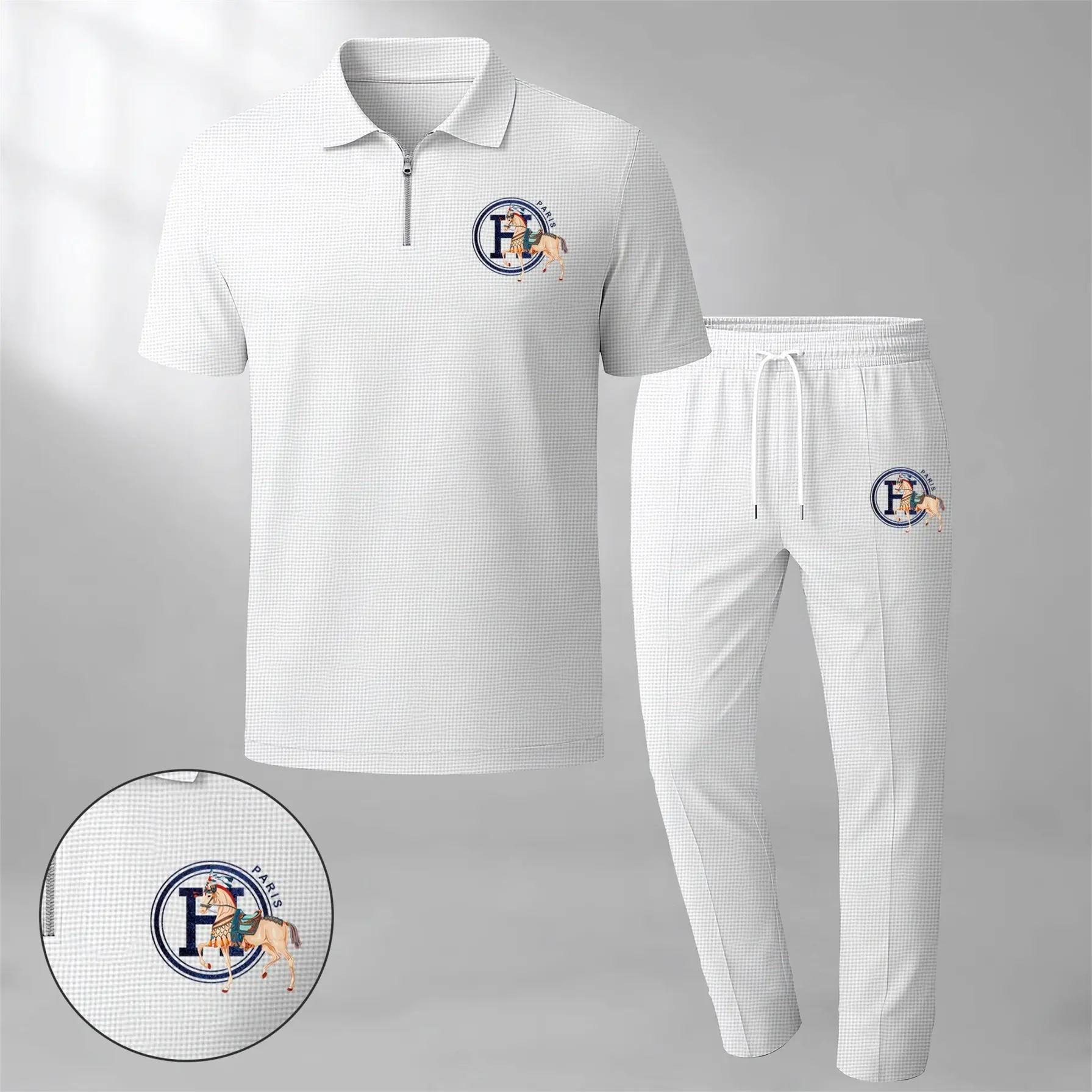 Men's two-piece set features a short-sleeve zip-collar polo shirt and matching trousers. Crafted from breathable, soft-textured waffle-knit fabric, it offers a comfortable, relaxed fit ideal for everyday casual wear.